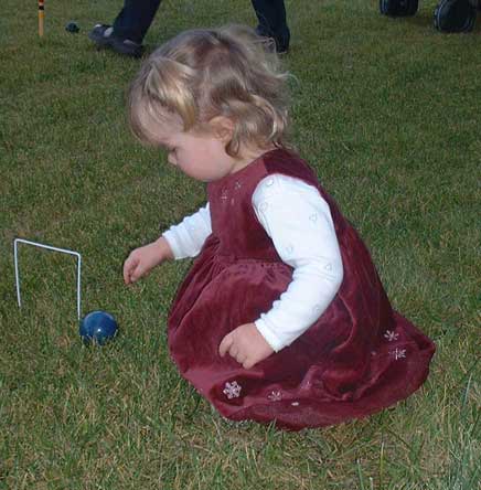 aly watching the croquet