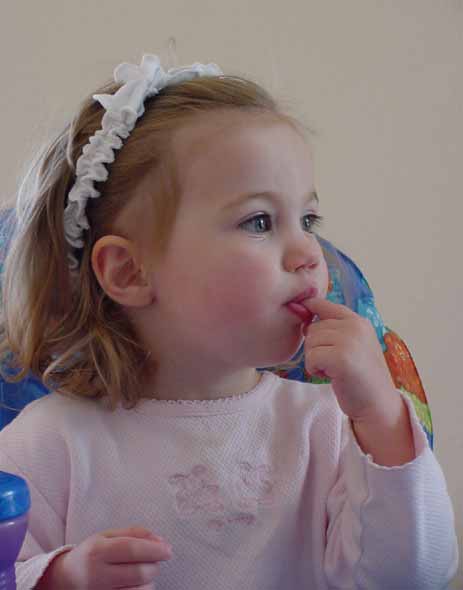 aly watching tv on her 2nd birthday