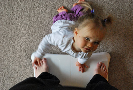 zoe helping me on the wii balance board